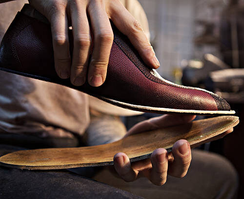 Shoemaker makes shoes for men.